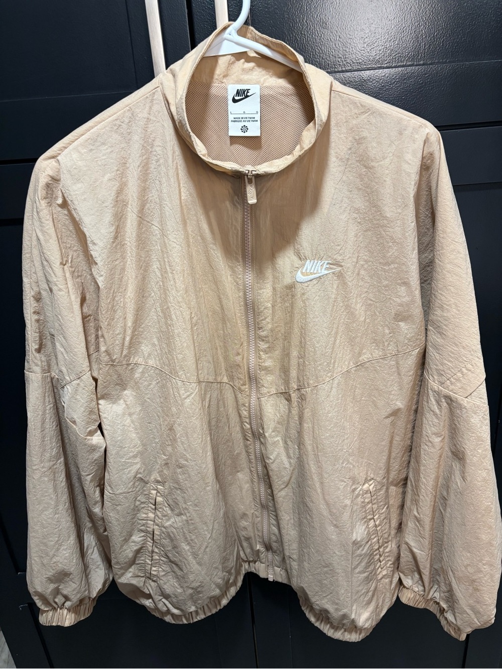 The Nike Beige Bomber Jacket